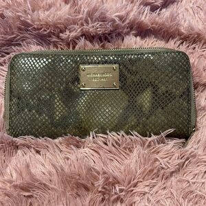 Used MK snakeskin zipper envelope wallet